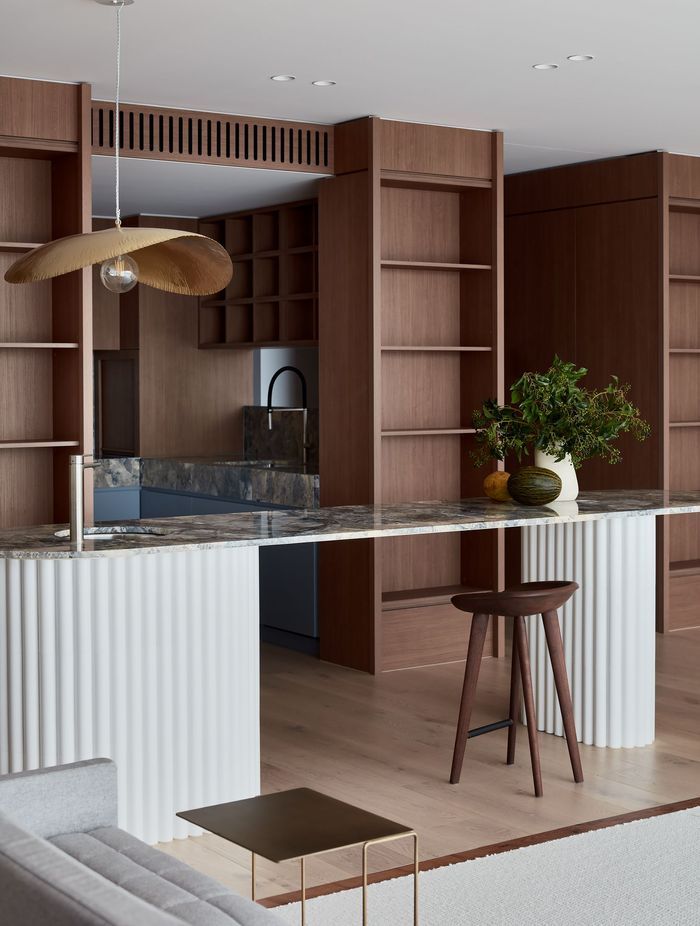 The Gervasoni Brass pendant in the living areas adds a touch of elegance.