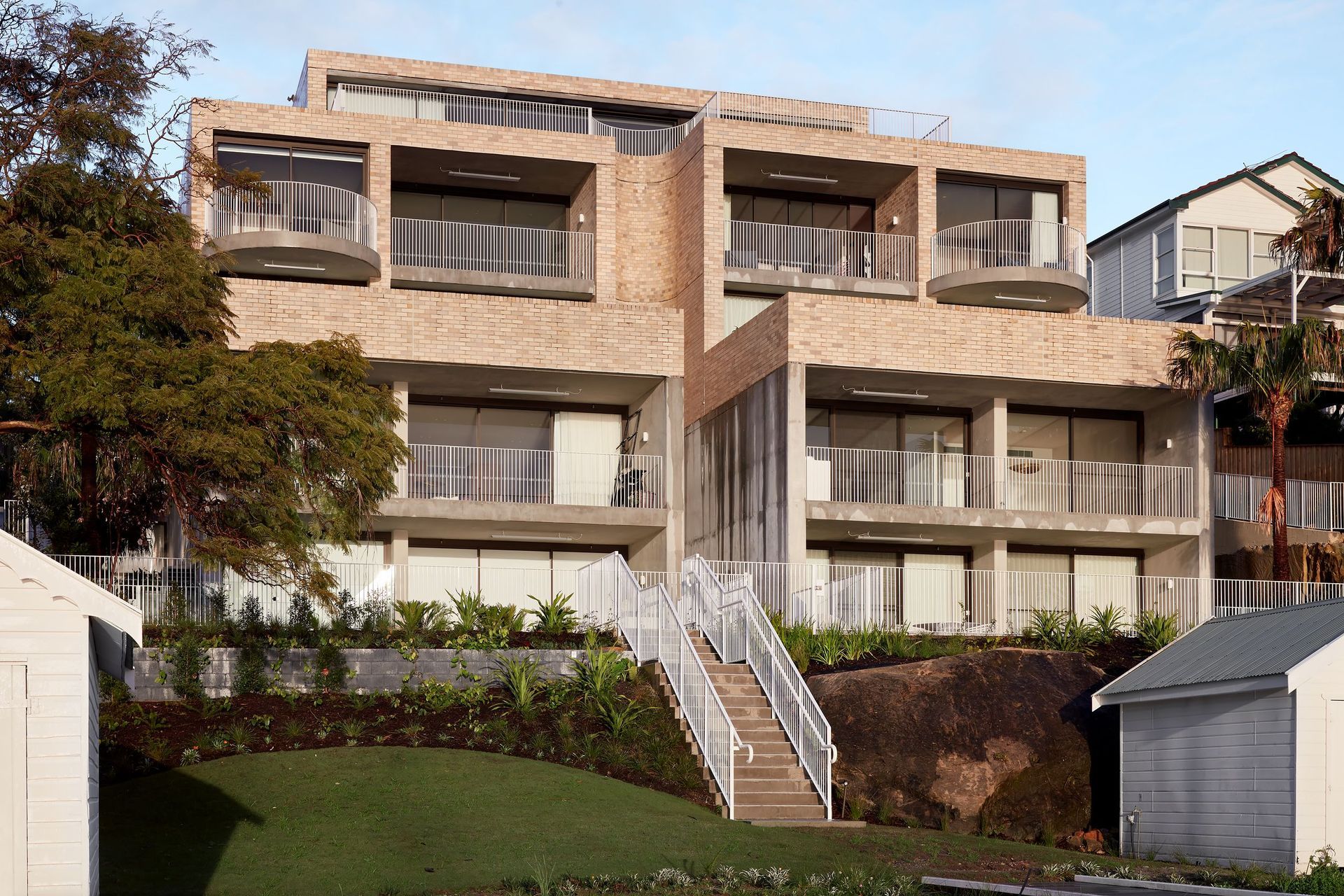 The Isles is connected directly to the harbour with gardens cascading down to the waterfront.