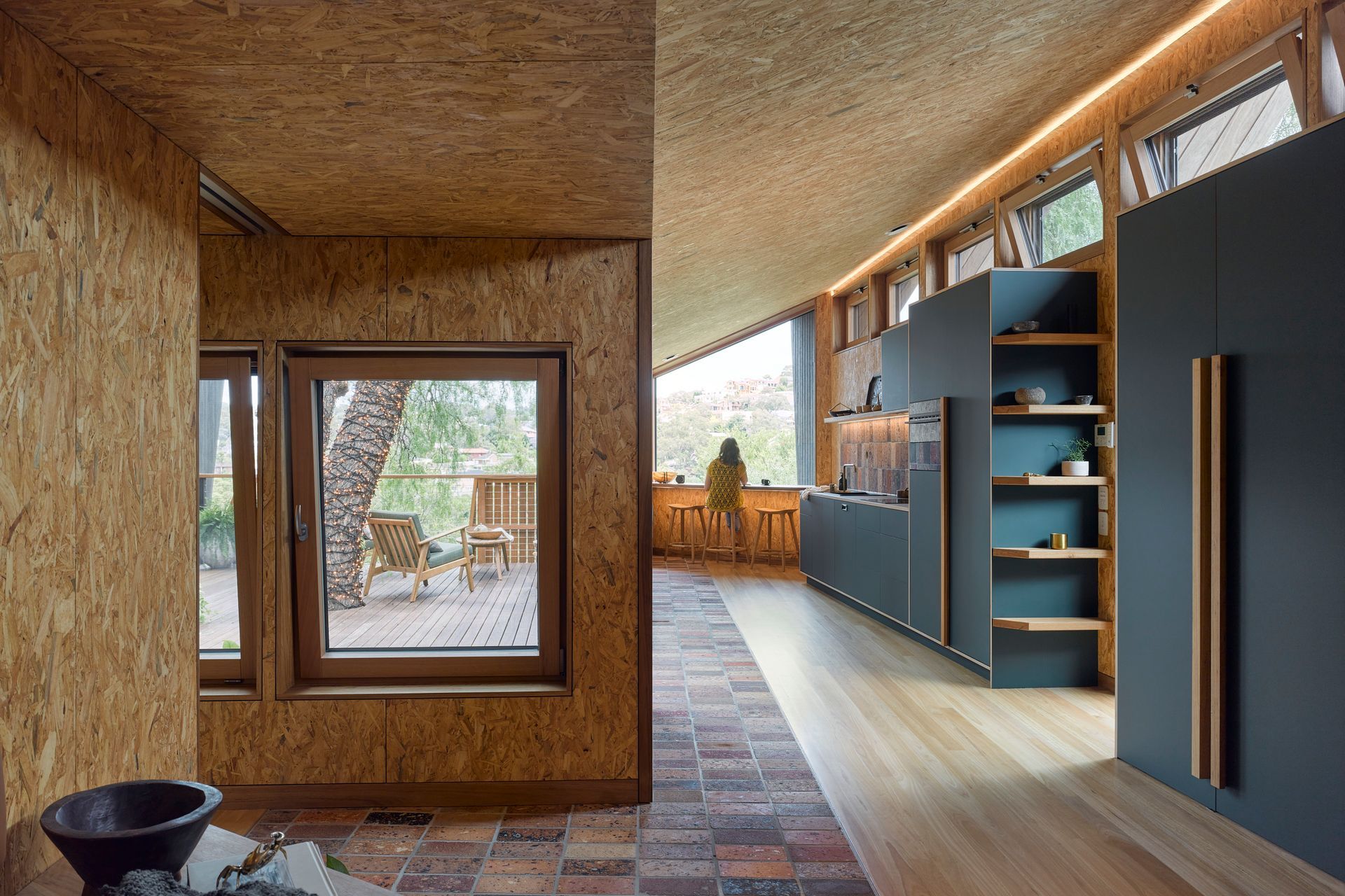 The sustainability lens unfurls between the natural and raw material palette – making use of recycled timber cladding and waste-concrete pavers.