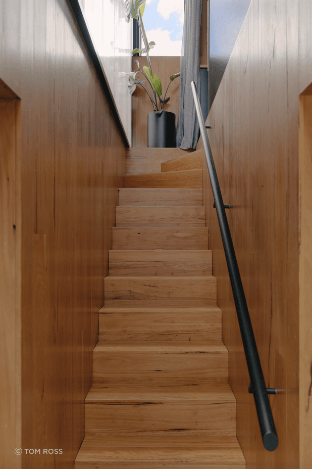 Stunning textural finishes are prominent throughout the earthy, light-filled home.