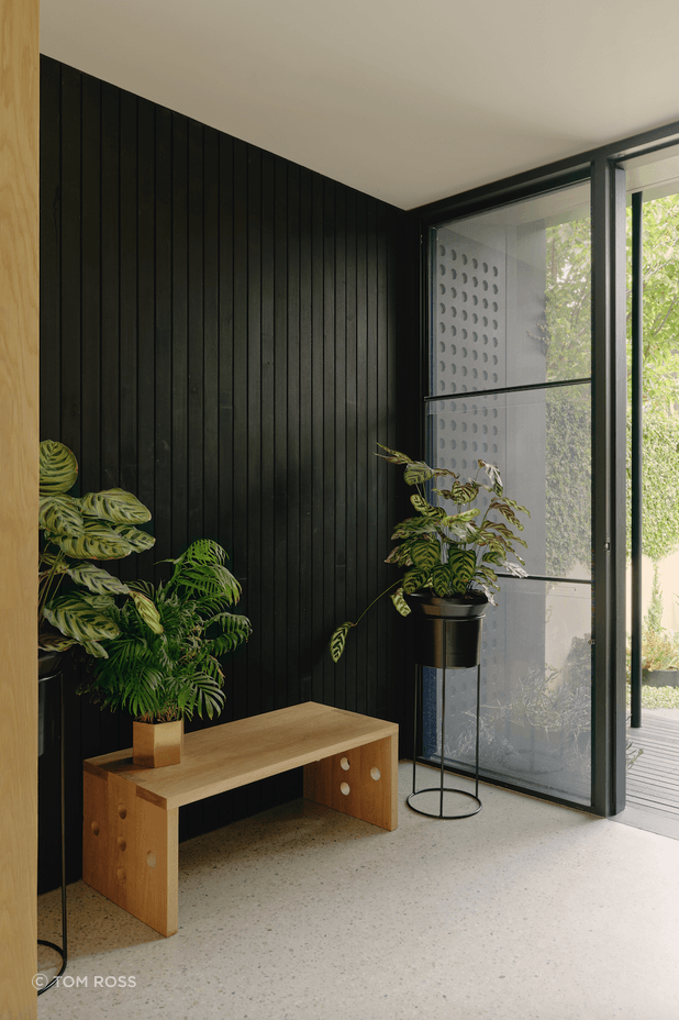 A deliberate blurring of boundaries between inside and out fosters a spacious, open feel, unlike the traditional formality of Victorian architecture.