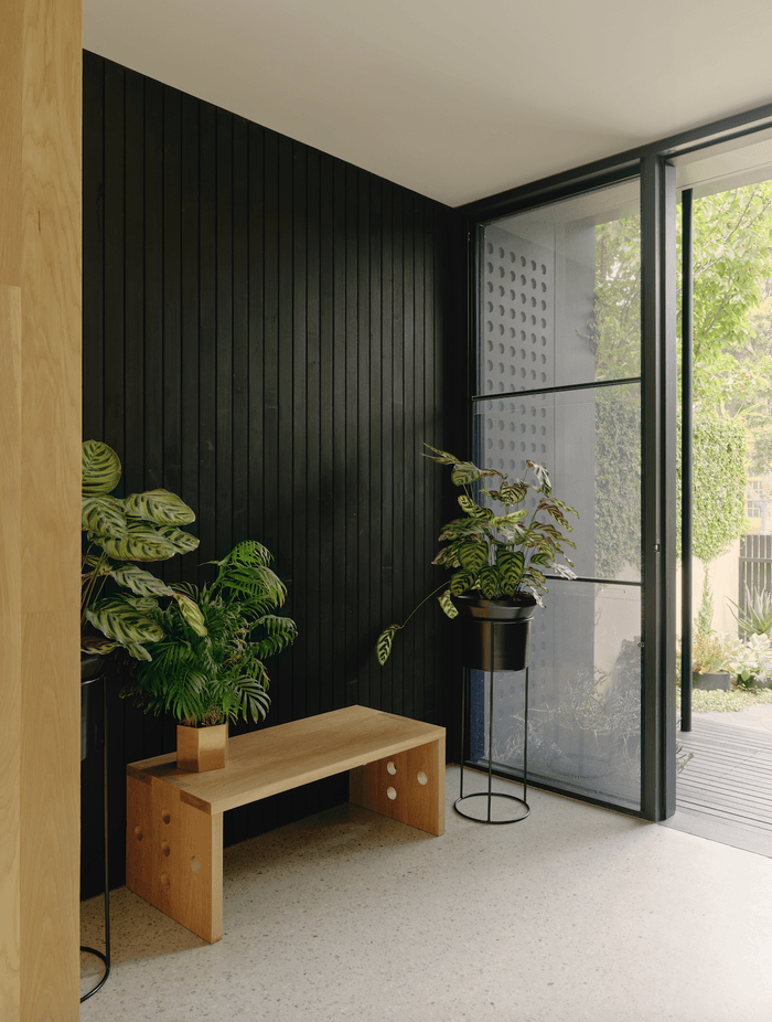 A deliberate blurring of boundaries between inside and out fosters a spacious, open feel, unlike the traditional formality of Victorian architecture.