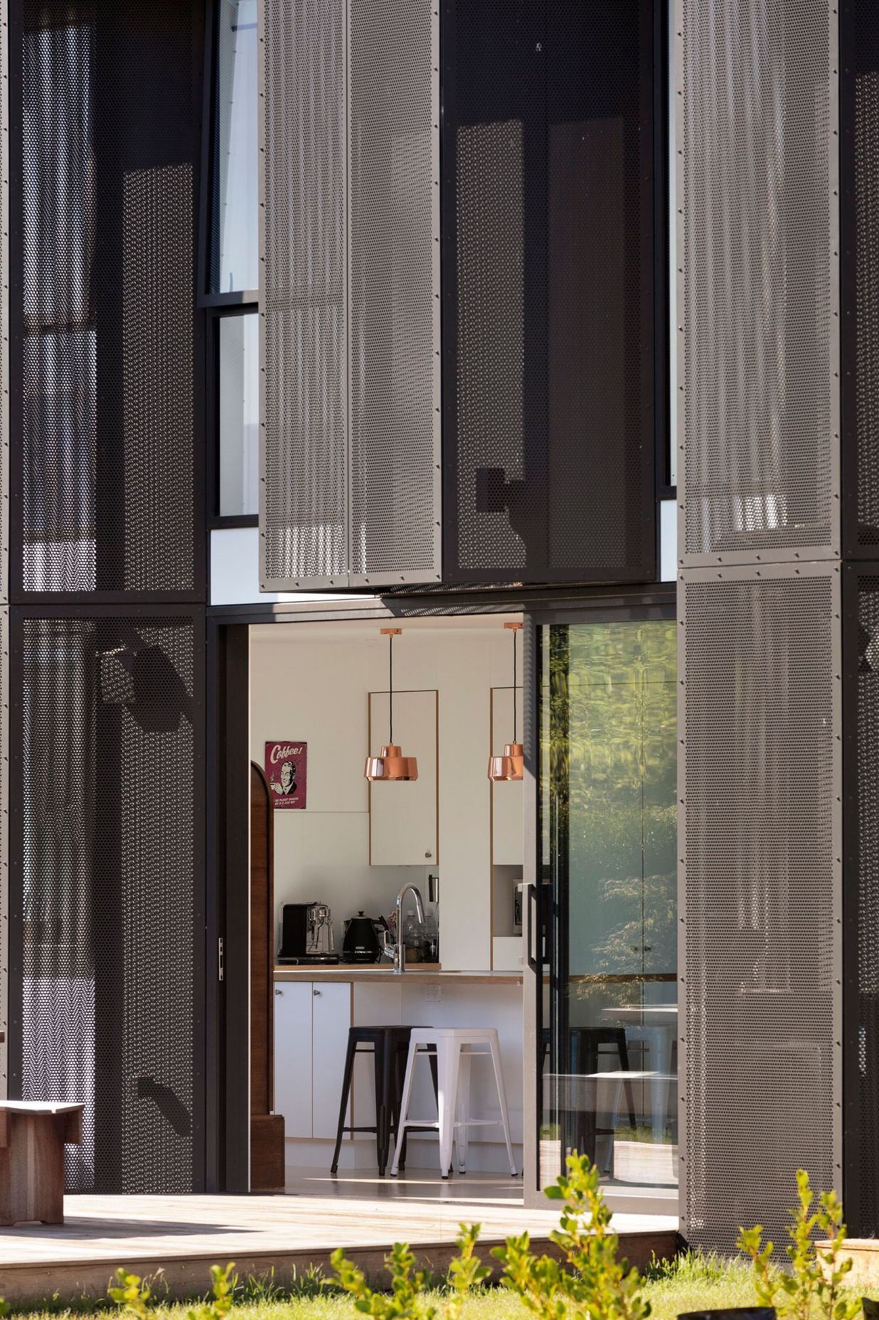 A close-up of the angled mesh screens on Arthurs Point Steel House by Team Green Architects. Photograph by Sam Hartnett.