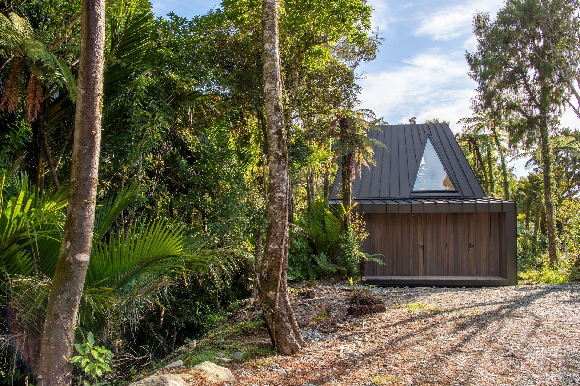 The stunning Punakaiki setting offers bush views in every direction.