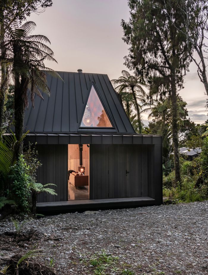 The triangular skylight offers views to the the cliff face above.