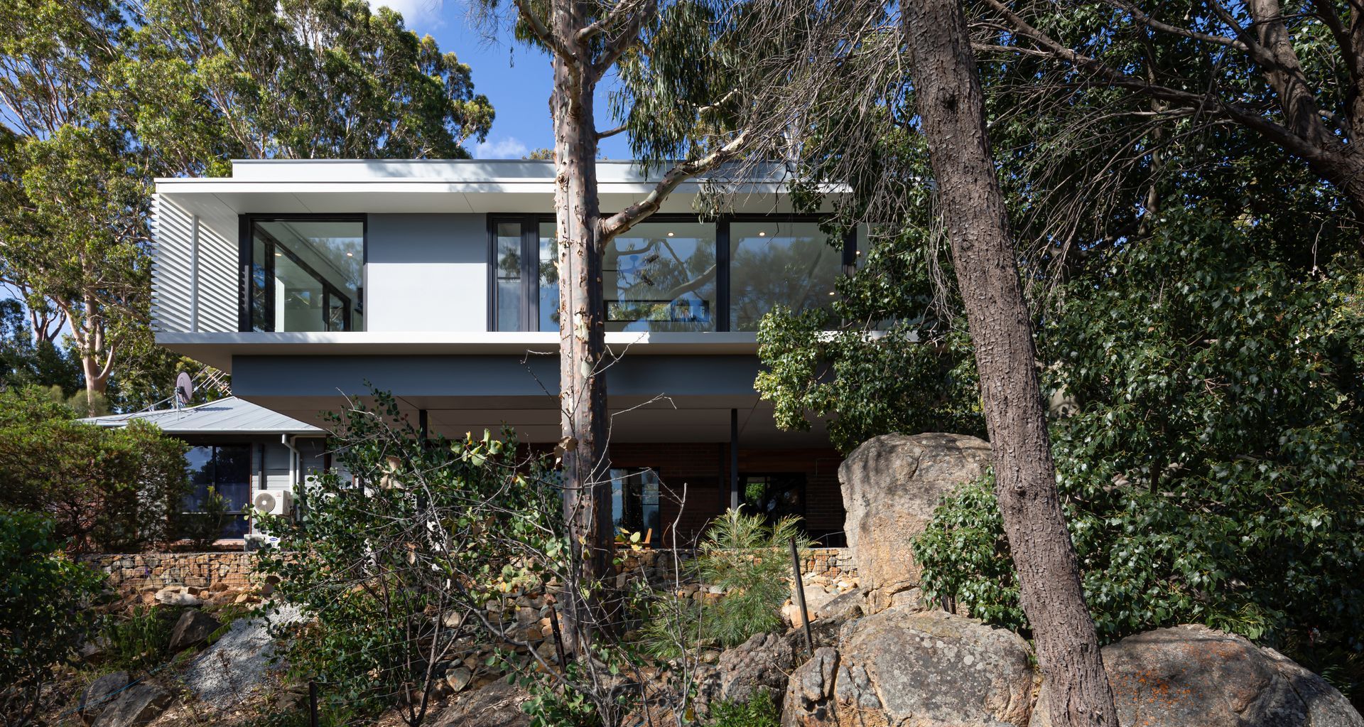 Known as The Treehouse, this exquisite addition further solidifies the homeowners’ connection to their home’s picturesque natural landscape. 
