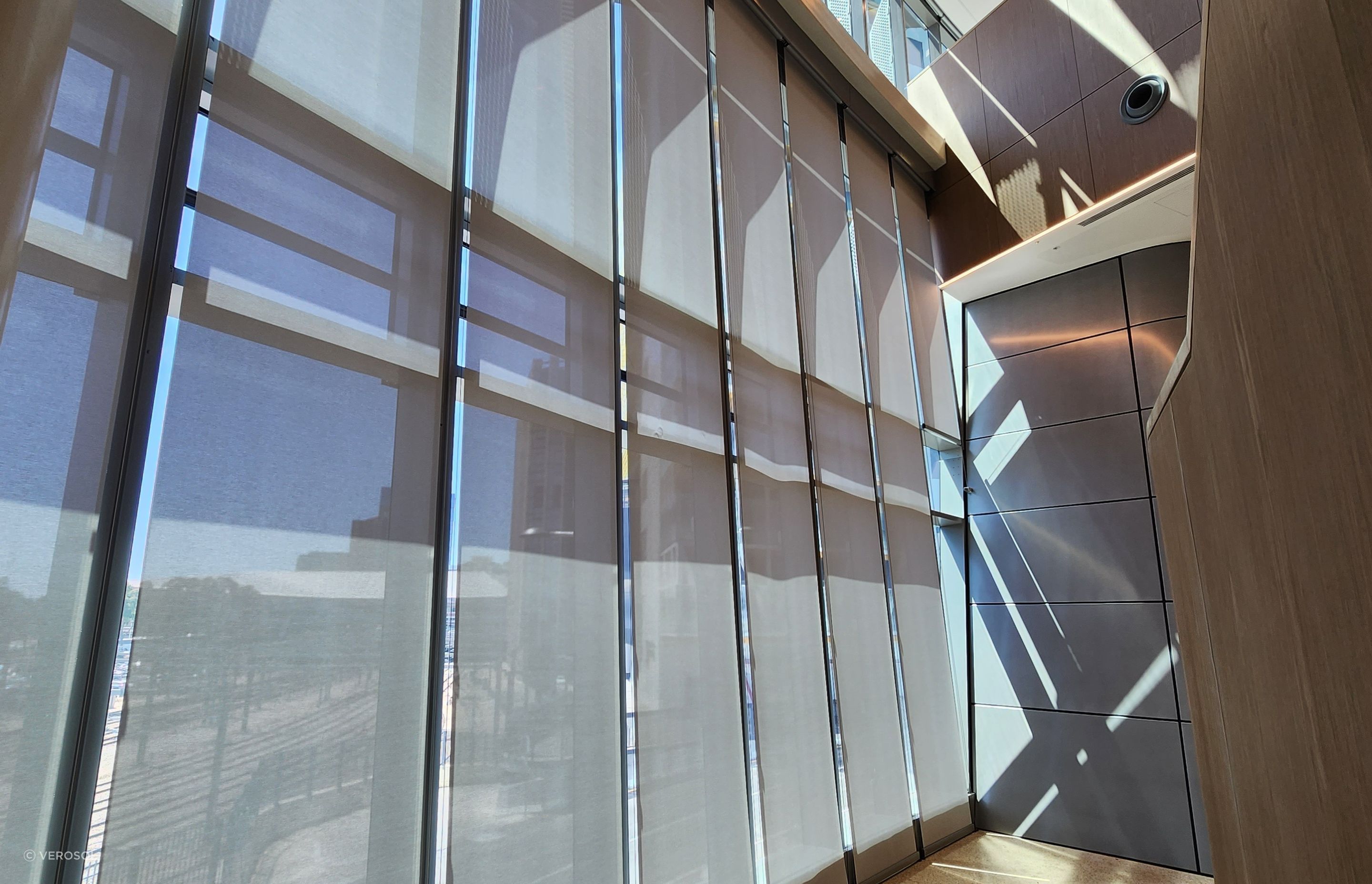 For the void area, a heavy-duty blind system was needed that could operate effectively with an 8-metre drop.