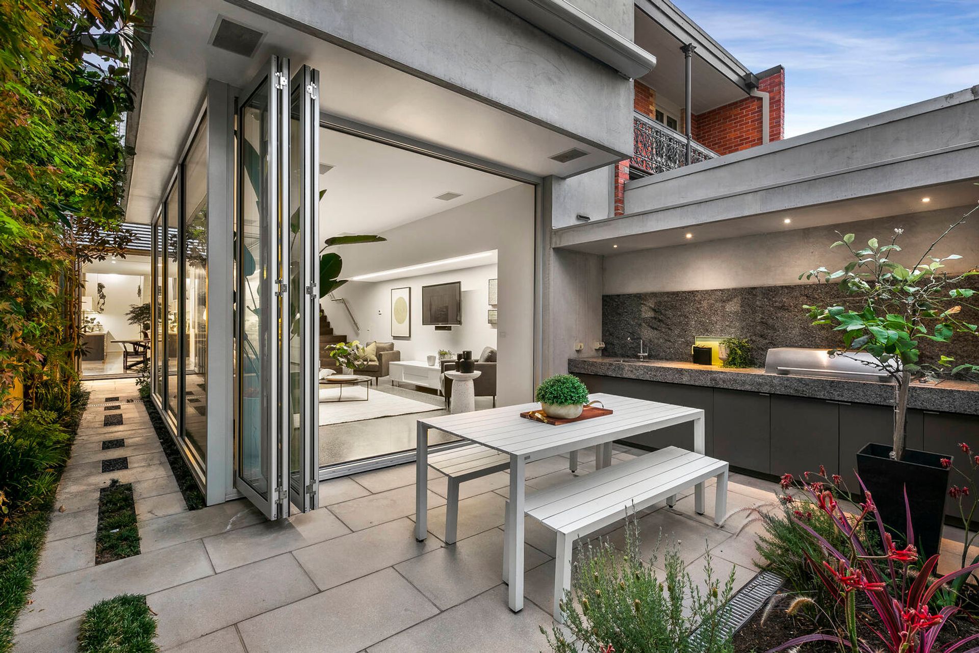 The brief was to provide separate sections but connect them together in a sleek, meaningful way – all within a five-metre wide site.