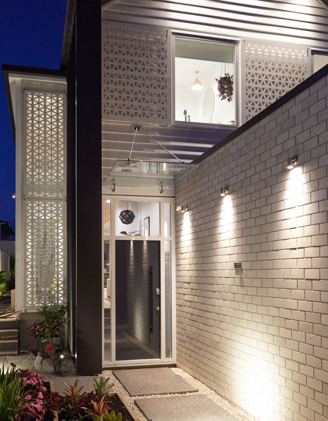 At Point Chevalier House, distinctive screens pay homage to the local neighbourhood.