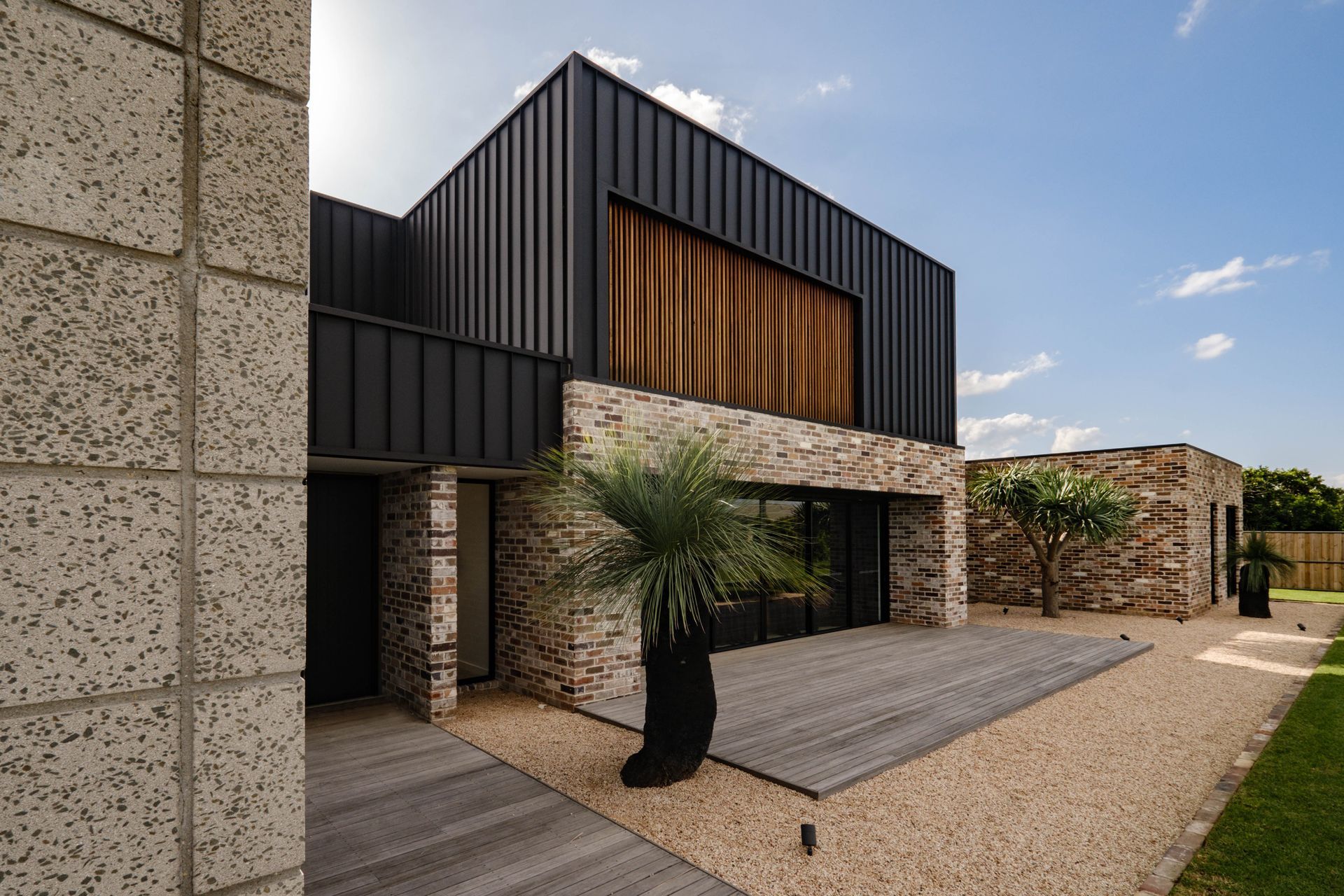 Metal cladding creates clean lines and a minimalist aesthetic on this facade