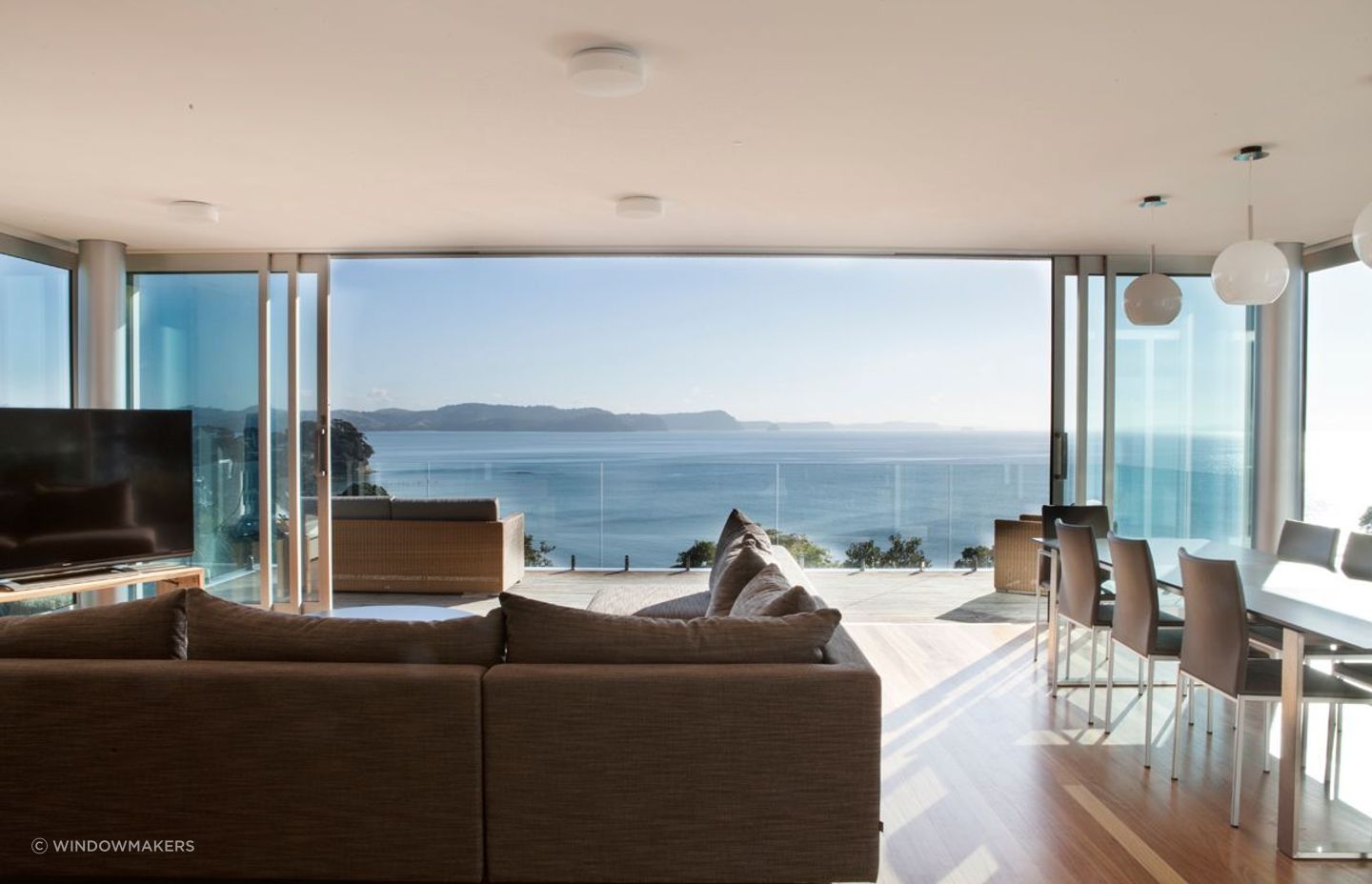 Glass doors, such as these by Windowmakers, provide a lot of area for light to stream inside. 