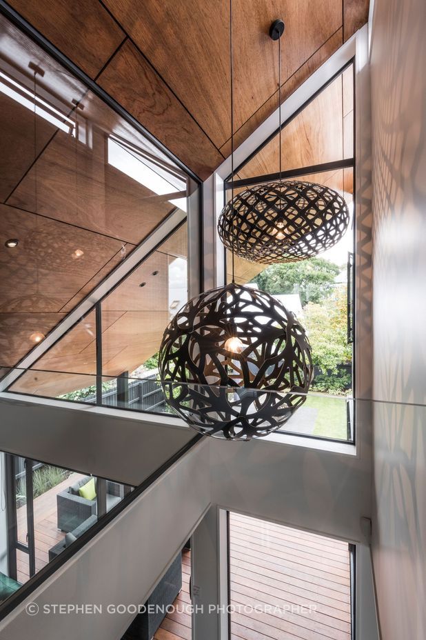The artfully constructed ply lining on the ceiling extends right out into the eaves outside.