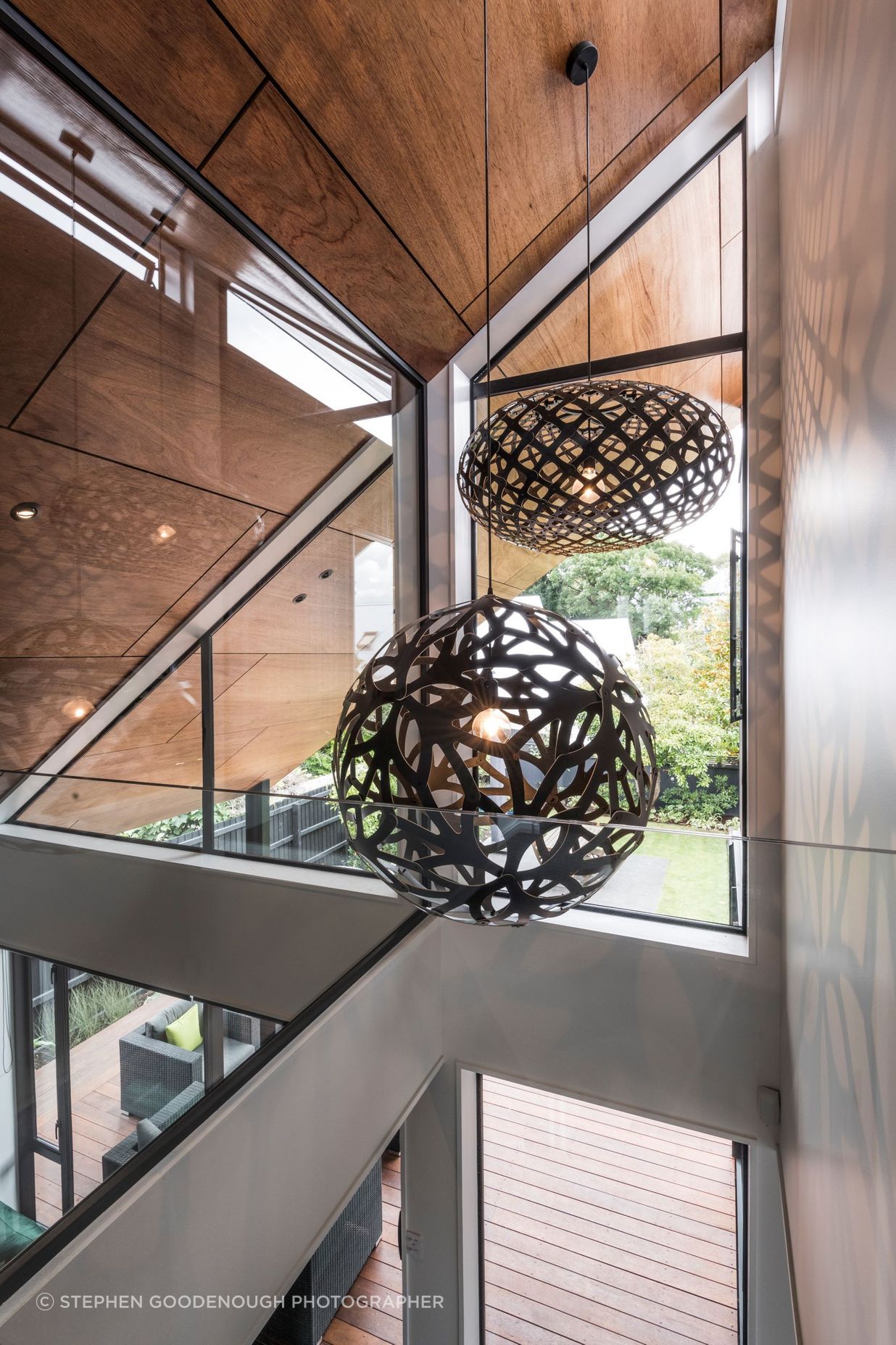 The artfully constructed ply lining on the ceiling extends right out into the eaves outside.