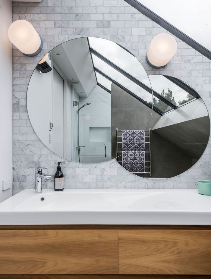 The interesting shapes of the exterior are carried through the interior, with angled rooflines juxtaposed against circular elements.