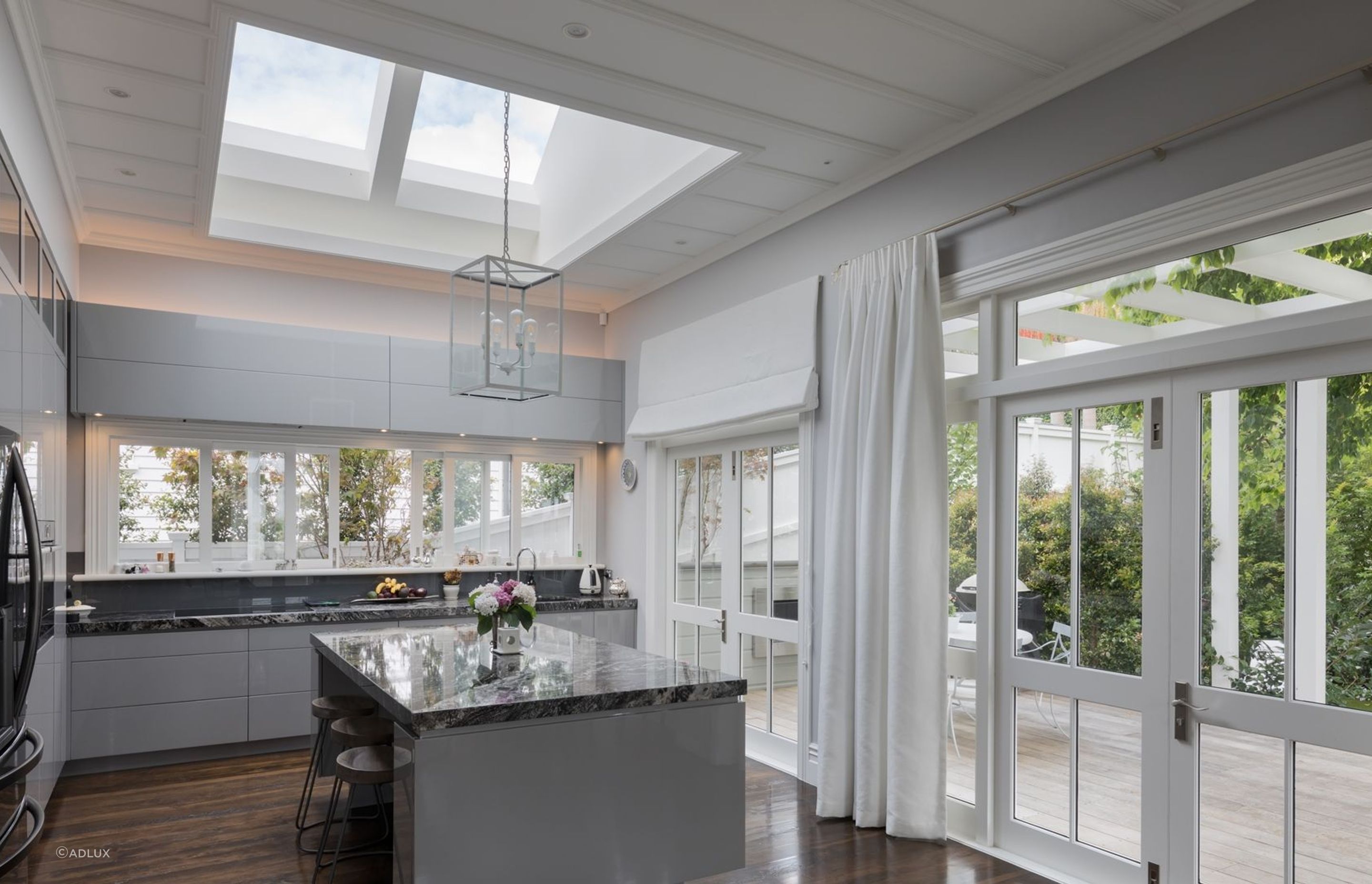 Skylights, such as this model from Adlux, can be very effective at increasing the ambient natural light.