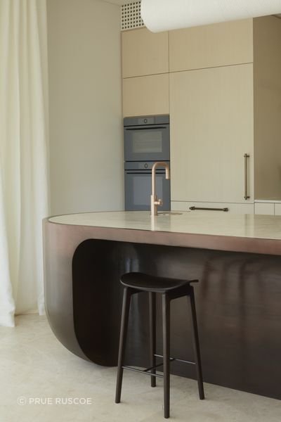 The liquid metal island defines the space