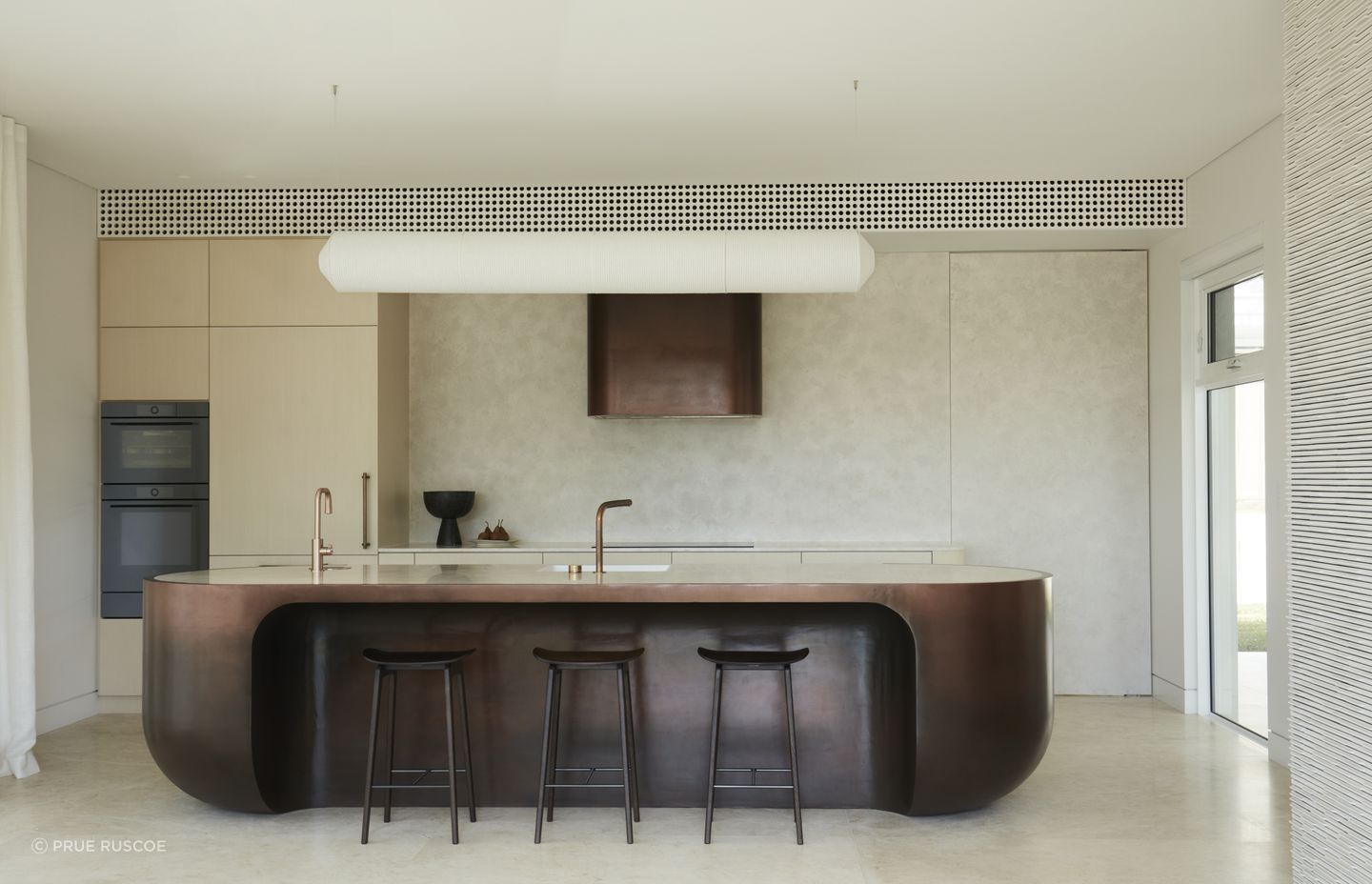 Liquid metal form the stunning kitchen island