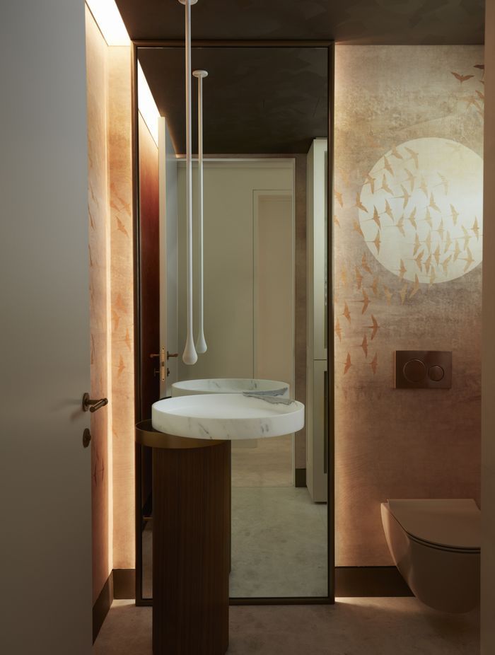 Exquisite hand-painted mural in the powder room