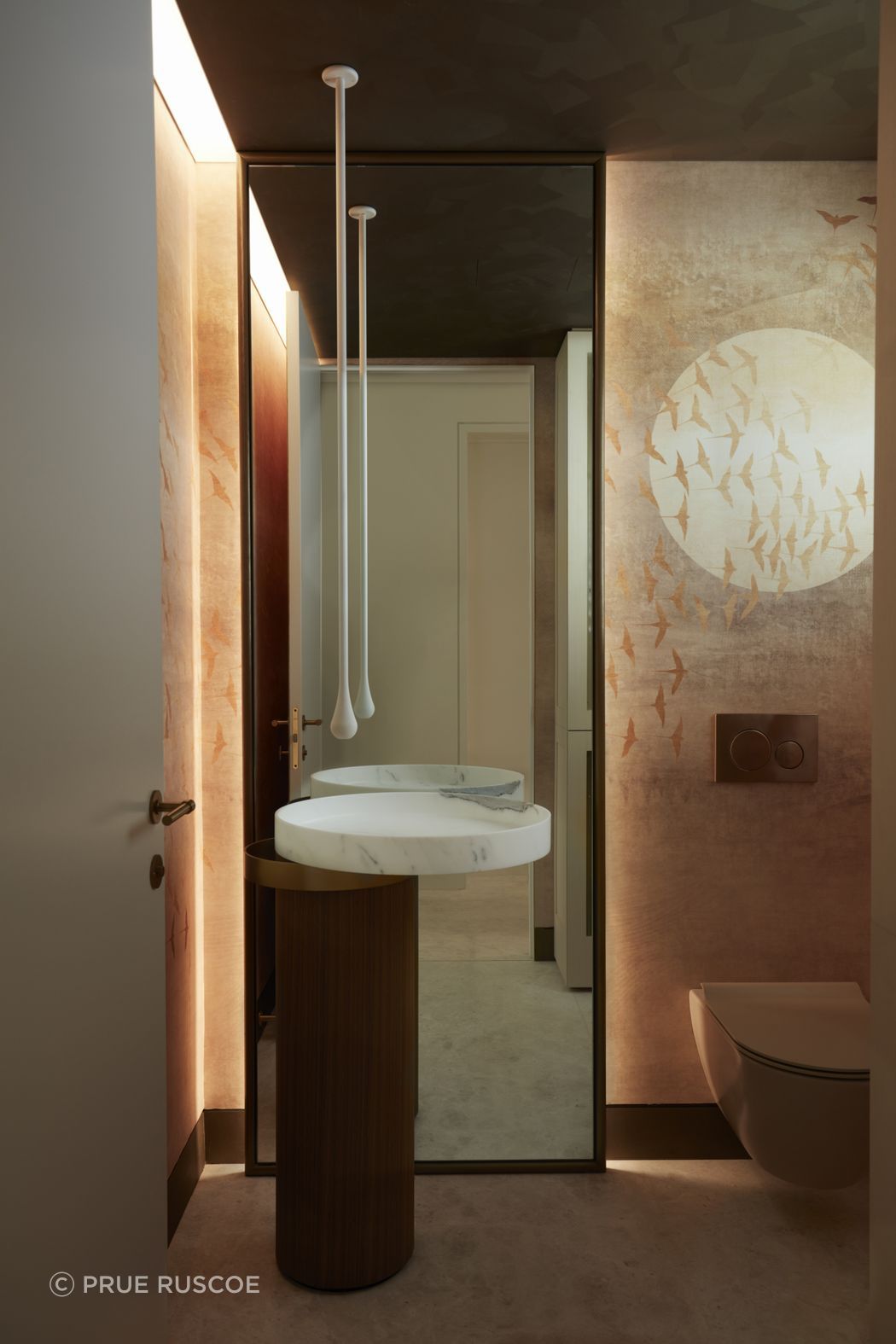 Exquisite hand-painted mural in the powder room