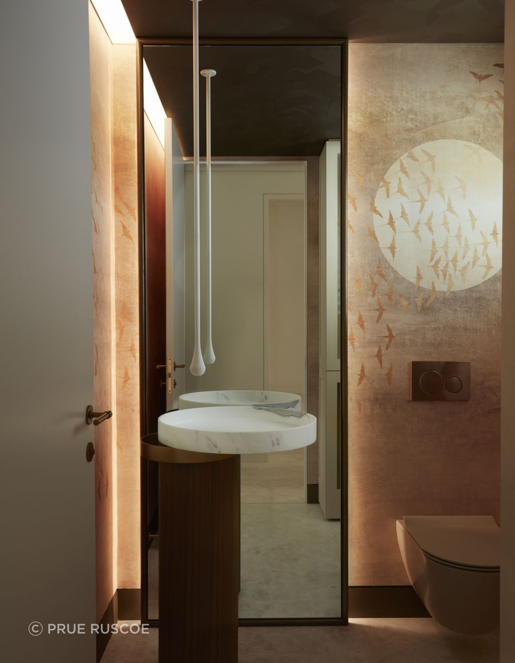 Exquisite hand-painted mural in the powder room