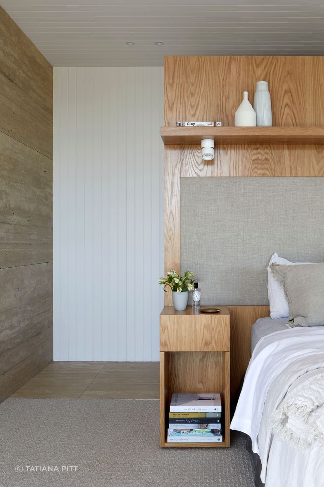 The main bedroom's built-in bedhead and side tables are a nod to mid-century design.