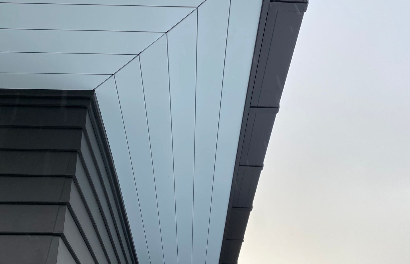 The Ribon Continuous Interlocking Soffit System integrates fascia, soffit, spouting and downpipes into a system of the same materials, all under one warranty.