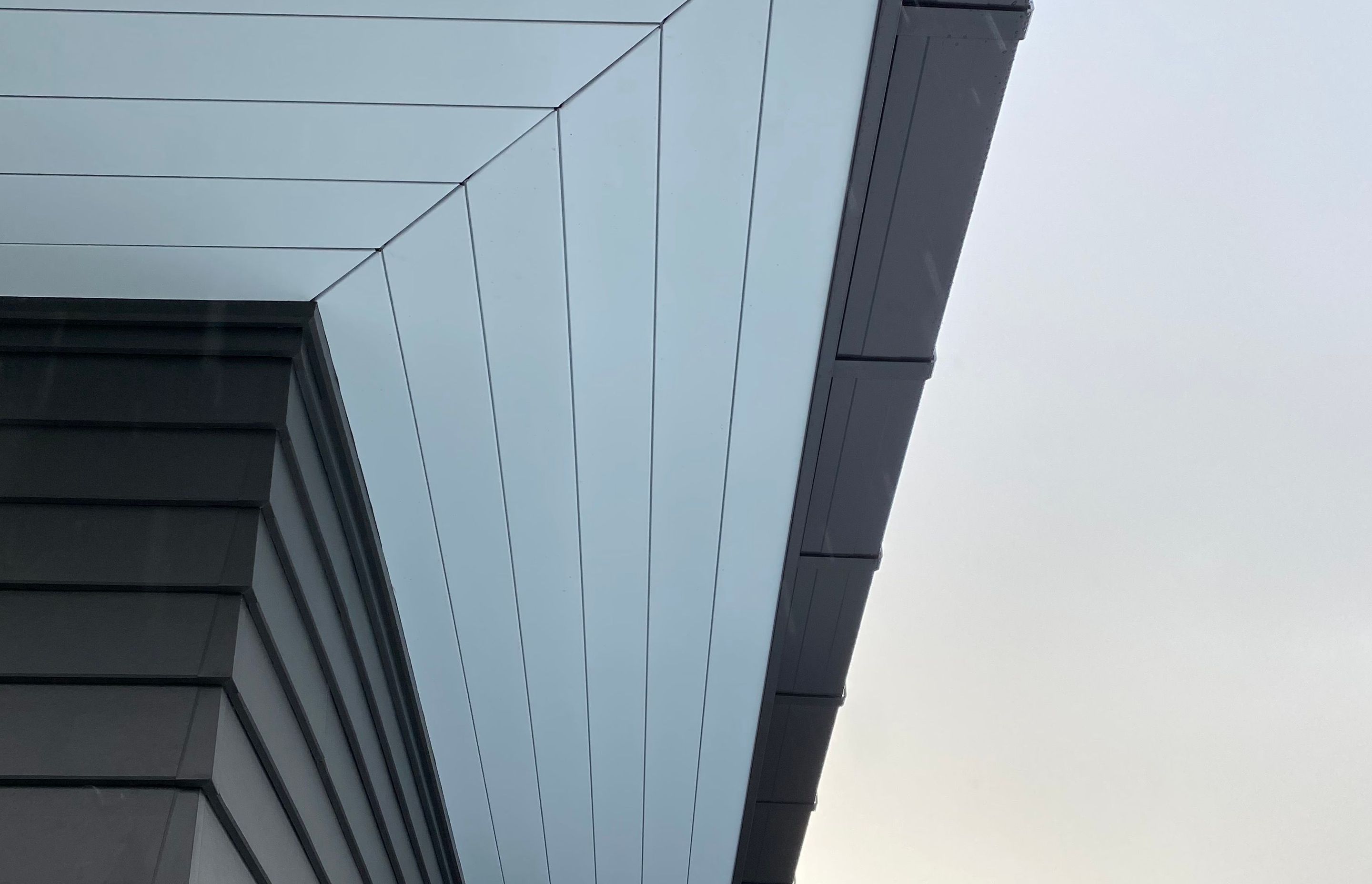 The Ribon Continuous Interlocking Soffit System integrates fascia, soffit, spouting and downpipes into a system of the same materials, all under one warranty.