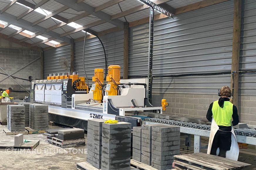 Timaru Bluestone's new polishing machine in action.