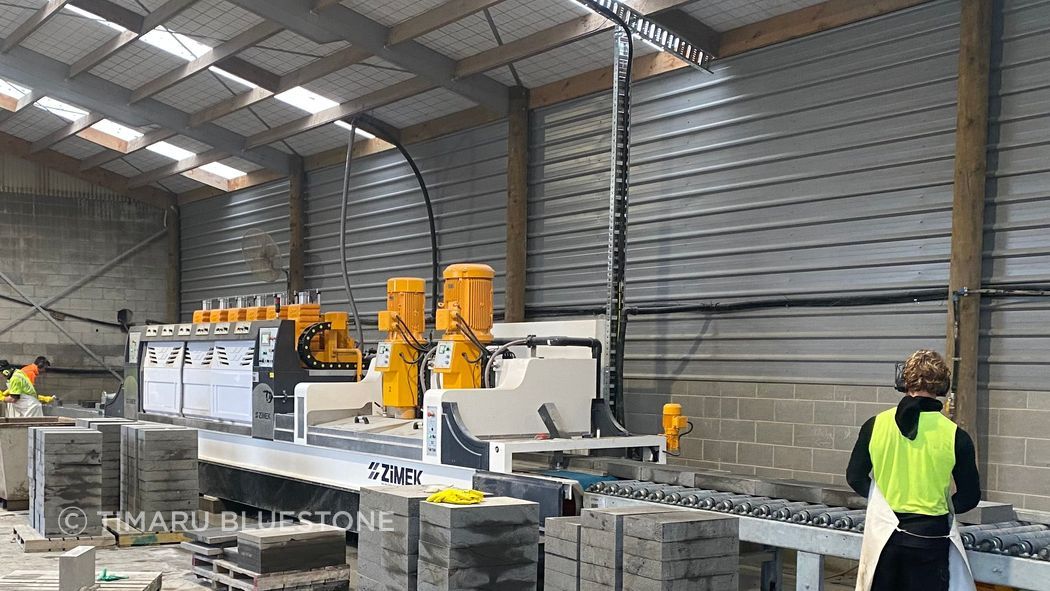 Timaru Bluestone's new polishing machine in action.