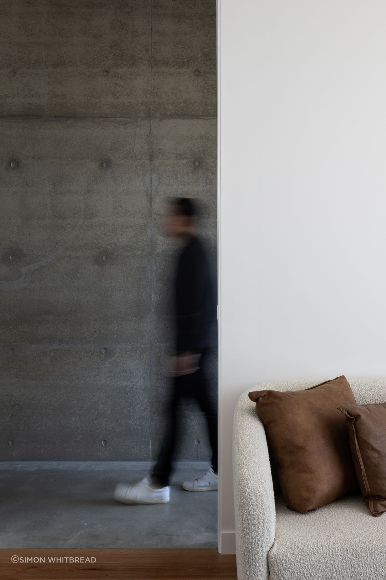 A mix of cold and warm materials create zones within the home.