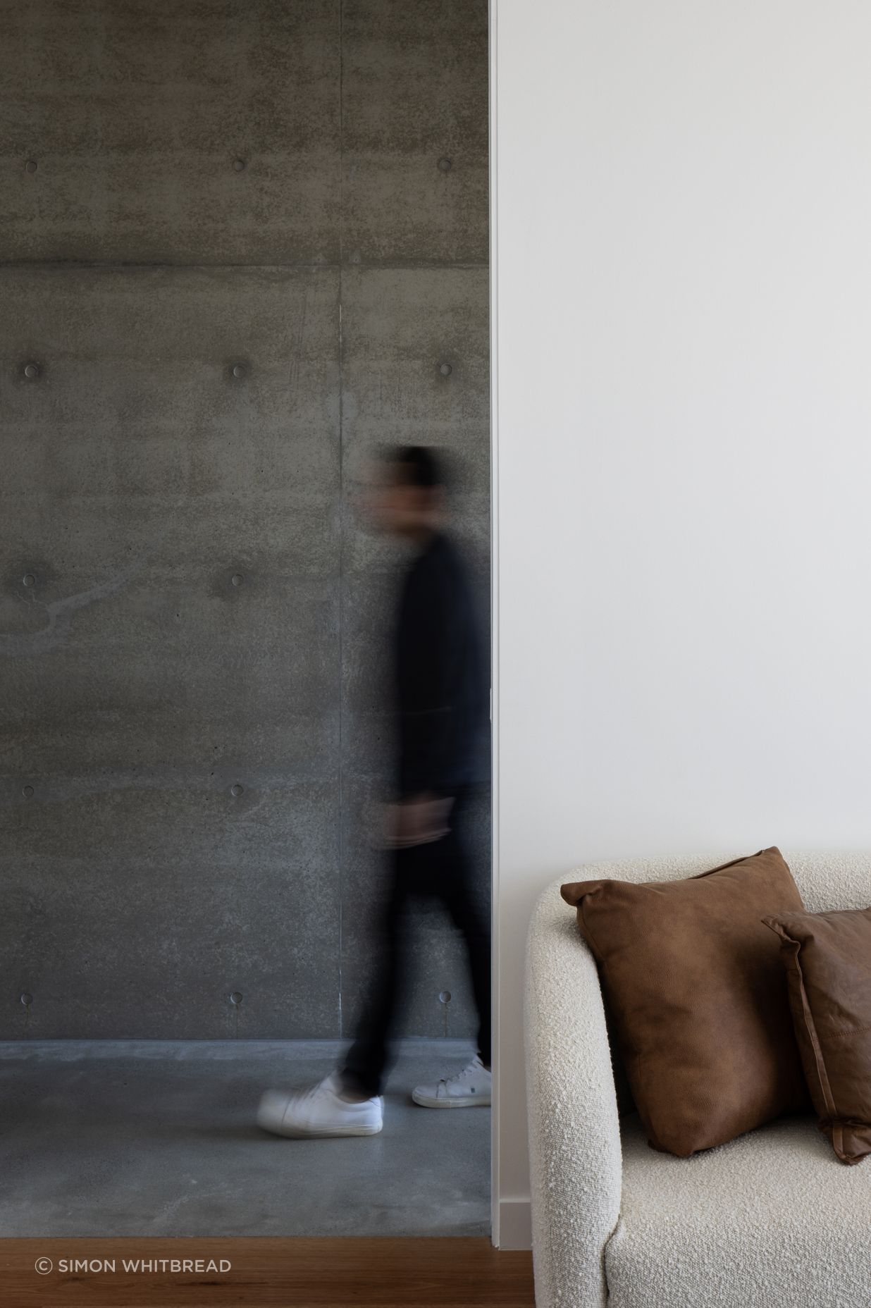 A mix of cold and warm materials create zones within the home.