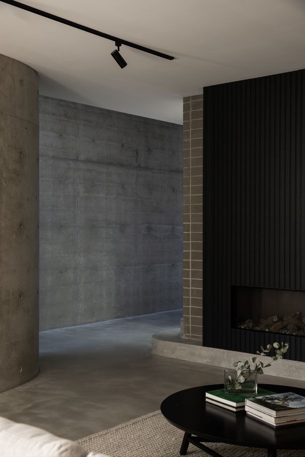 Monochromatic greys and robust materials line the downstairs.