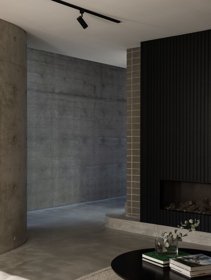 Monochromatic greys and robust materials line the downstairs.