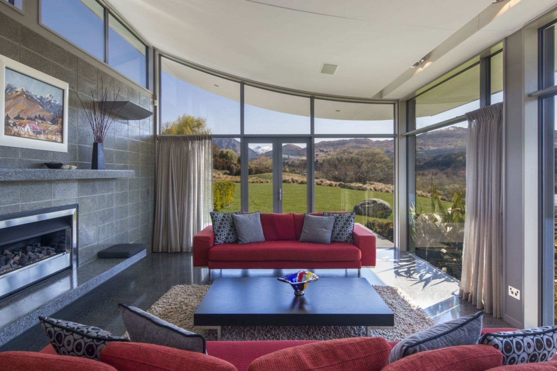 Concrete walls and floors provide thermal mass that helps the home stay warm in winter. | Photography: Marina Matthews