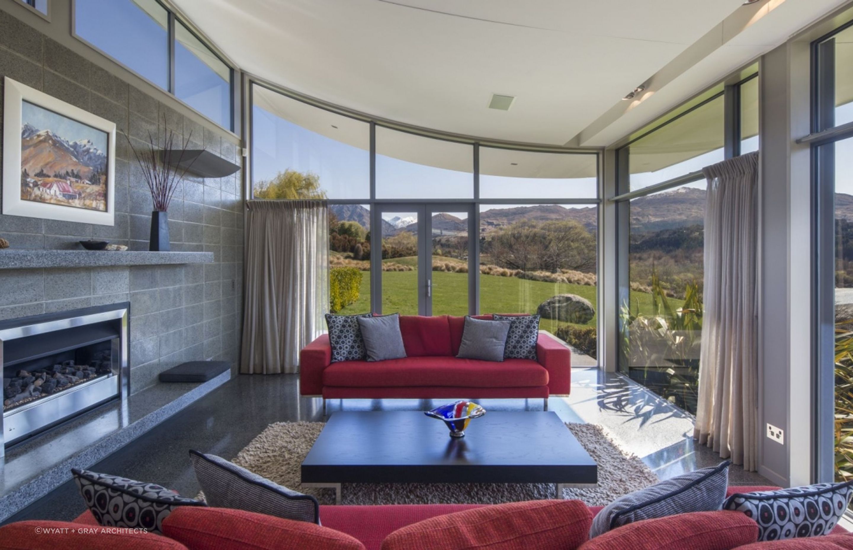 Concrete walls and floors provide thermal mass that helps the home stay warm in winter. | Photography: Marina Matthews
