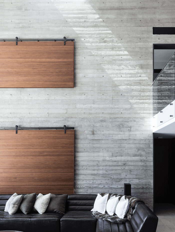 A deliberate effort has been made by the architects to add warmth to and eradicate the somewhat harsh appearance of concrete.