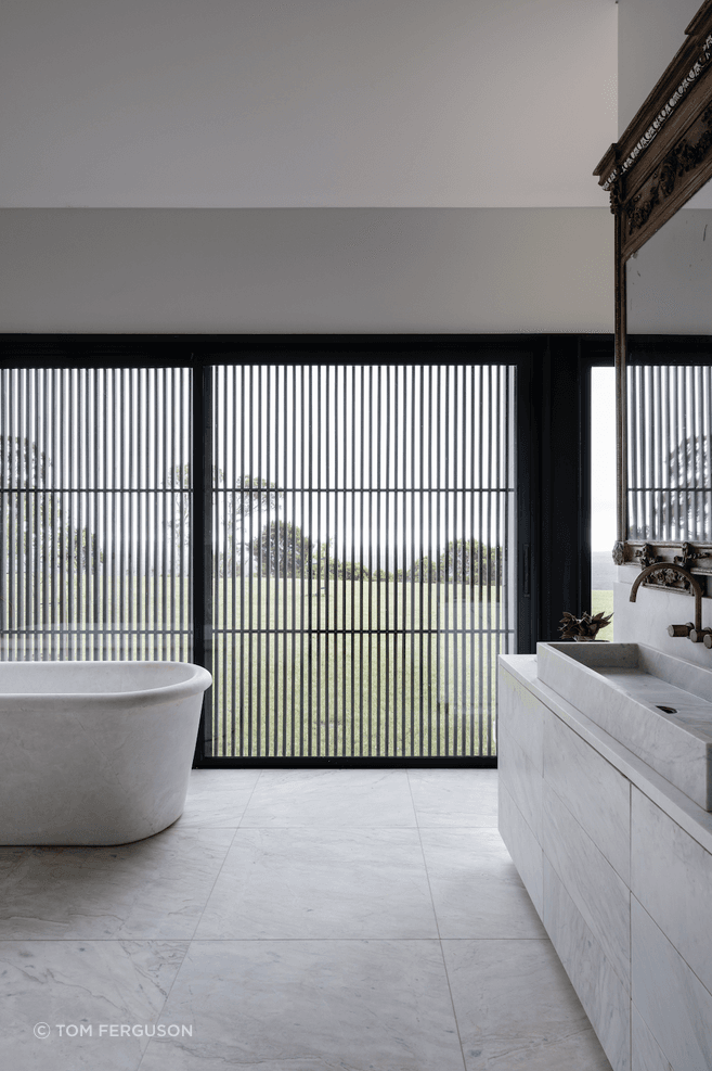Textures, colours, warmth and views are used sagaciously to help big spaces feel tailored to human scale.