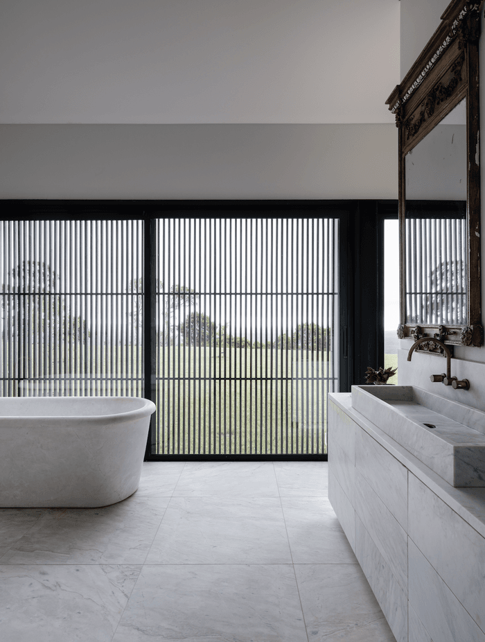 Textures, colours, warmth and views are used sagaciously to help big spaces feel tailored to human scale.