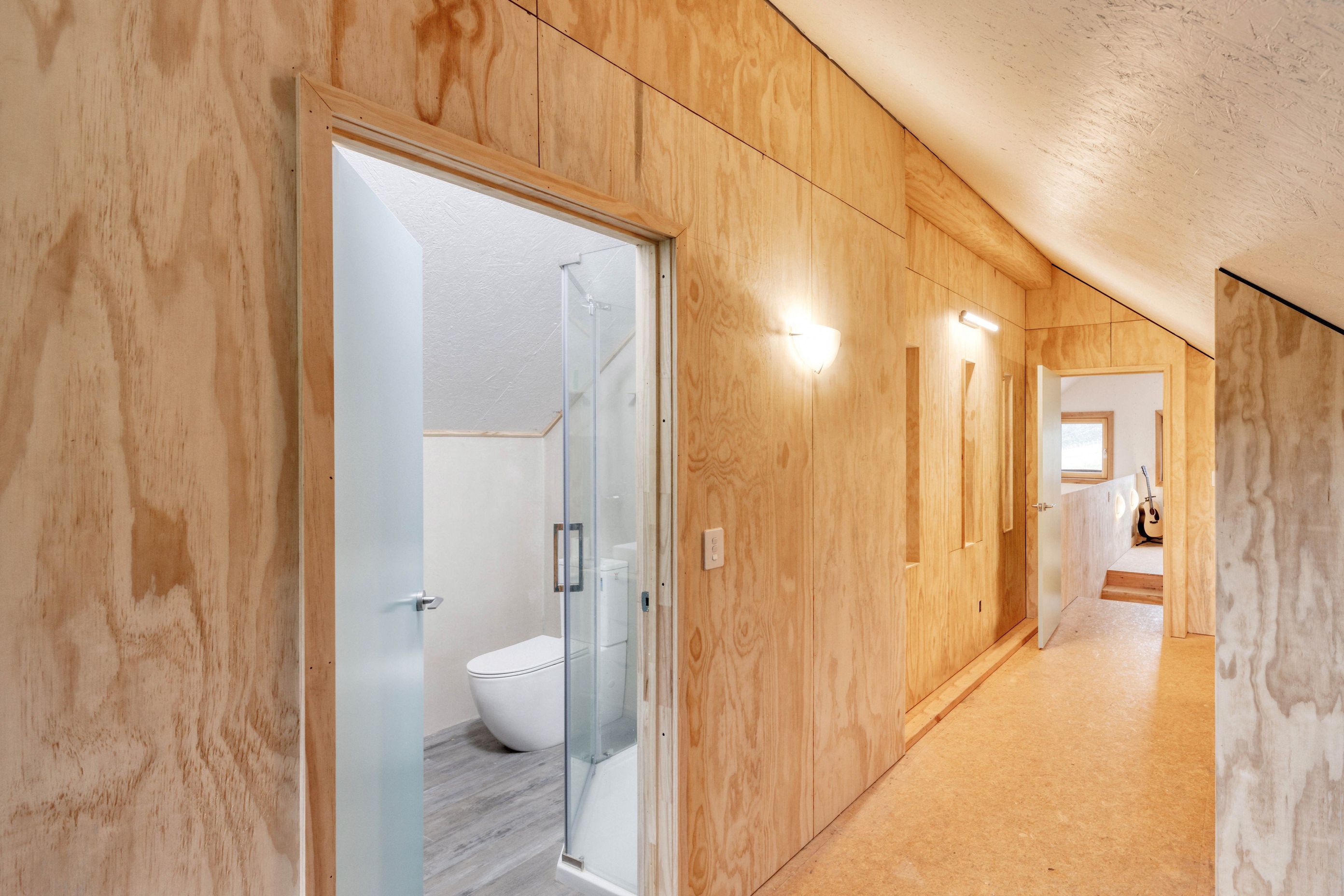 The sustainable vinyl bathroom flooring is by Inzide.