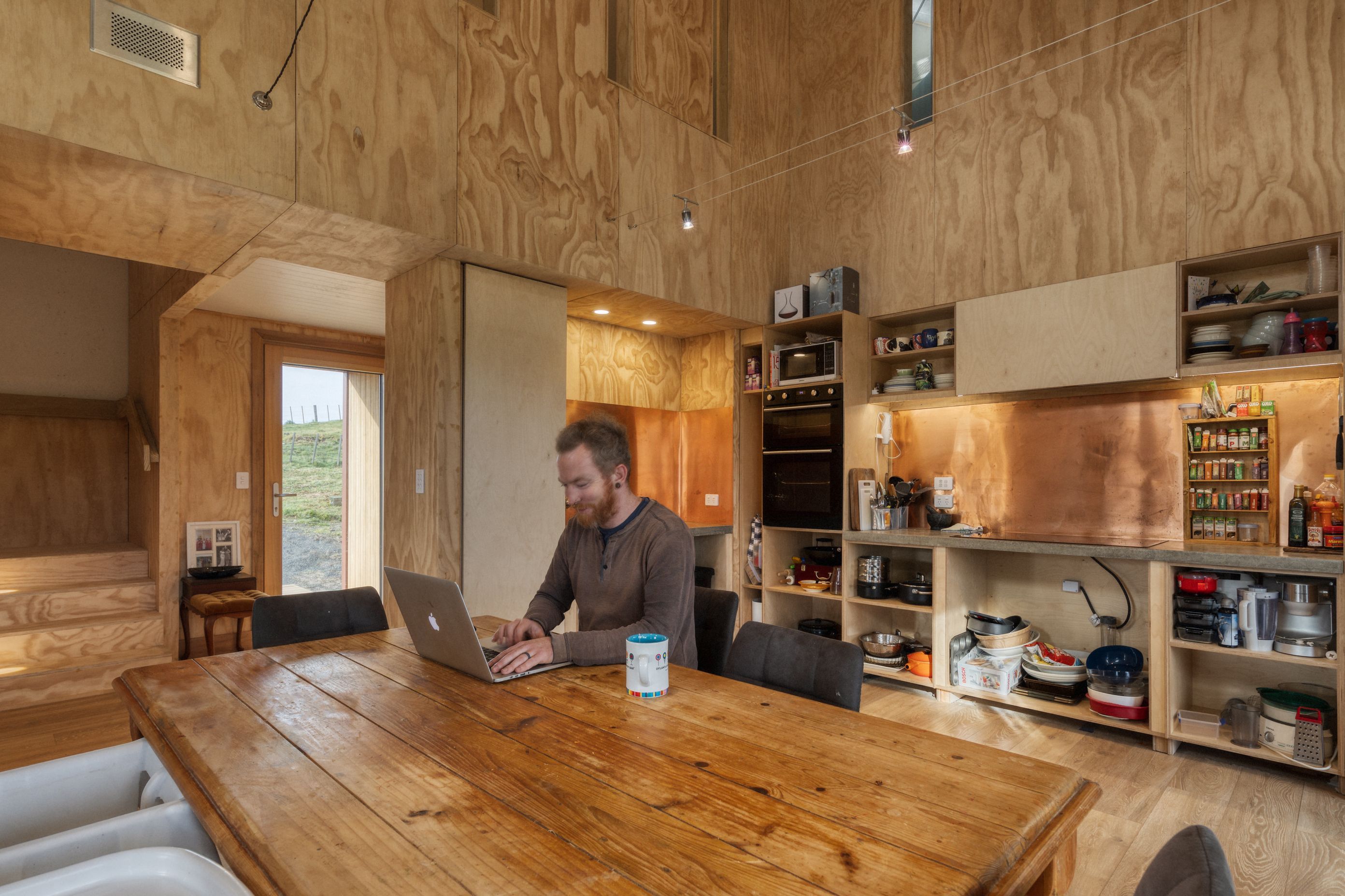 The rope light in the kitchen is by Superlux, chosen to complement the high ceilings. “Because we've got quite a small footprint, we’re using heights to create space,” says Joseph. The kitchen is gradually being completed as time and budget permits.