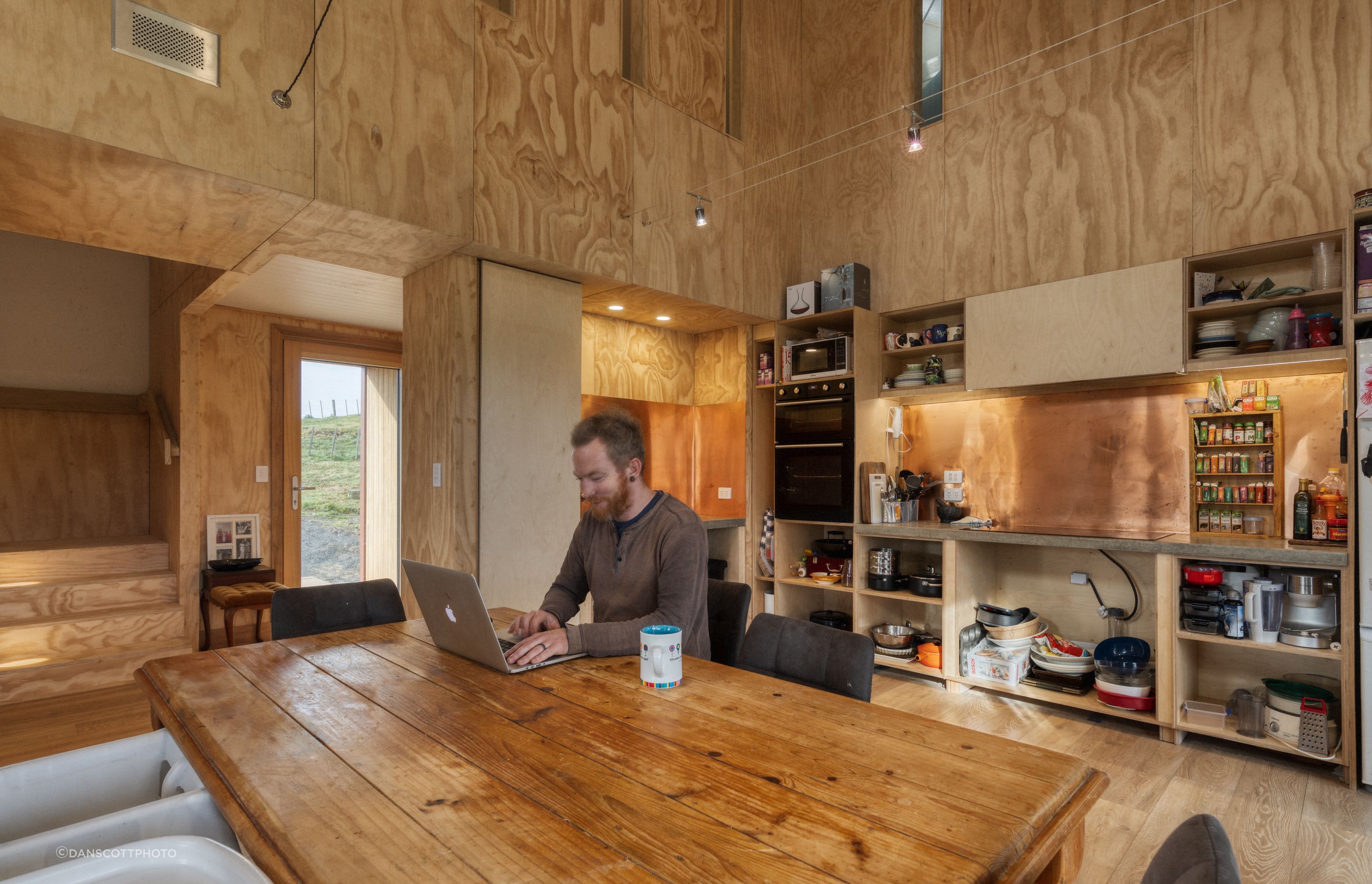 The rope light in the kitchen is by Superlux, chosen to complement the high ceilings. “Because we've got quite a small footprint, we’re using heights to create space,” says Joseph. The kitchen is gradually being completed as time and budget permits.