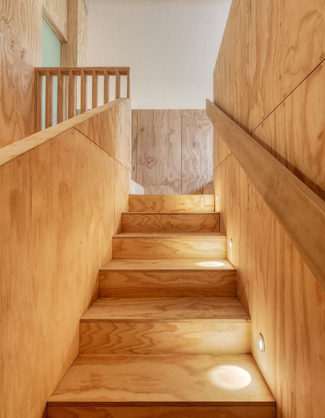 “Our kids had a habit of drawing on the walls,” says Joseph. “So plywood means we can sand it off. If at a later date we get bored of the plywood we can whitewash it or we can line over it.”