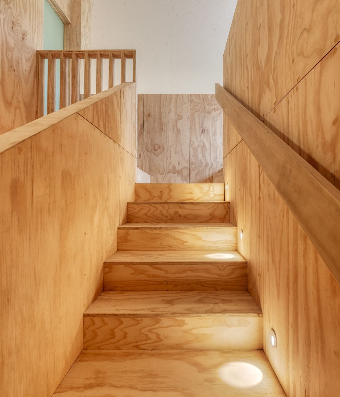 “Our kids had a habit of drawing on the walls,” says Joseph. “So plywood means we can sand it off. If at a later date we get bored of the plywood we can whitewash it or we can line over it.”