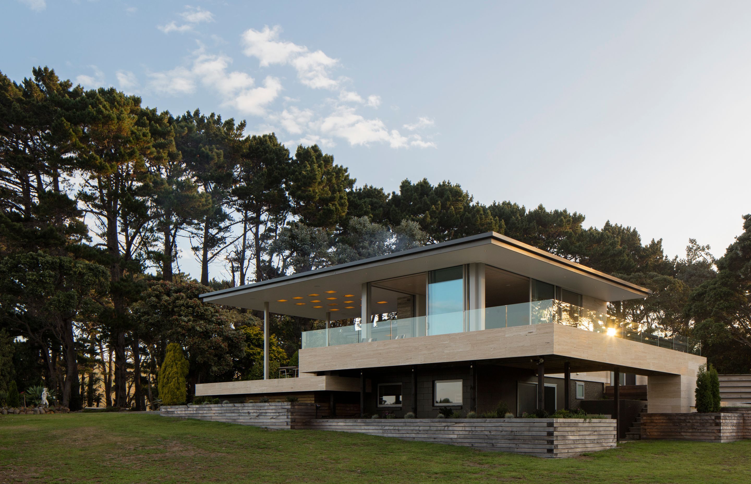 The roof on Northland Lake House is free from the main part of the existing house, proving shelter without compromising the views.