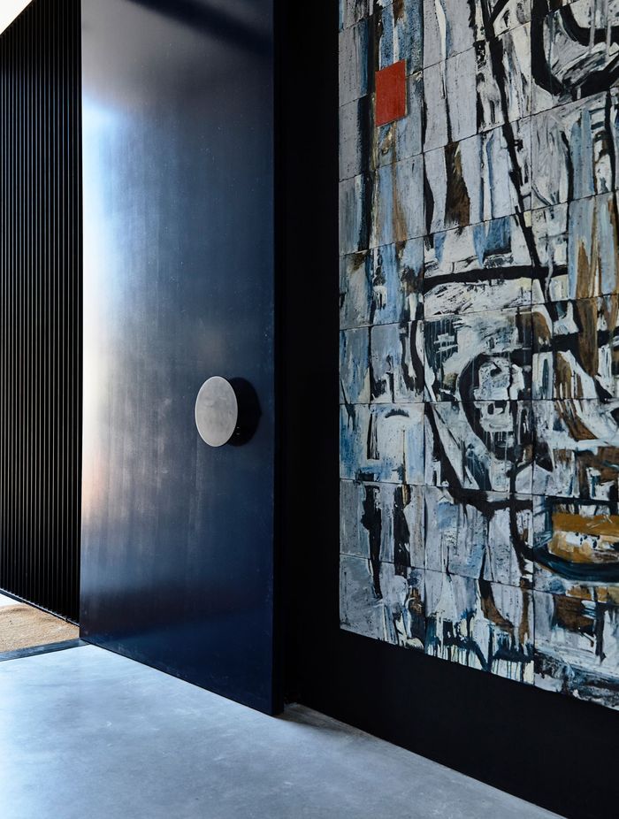 This new suburban home comfortably houses an extensive art collection.