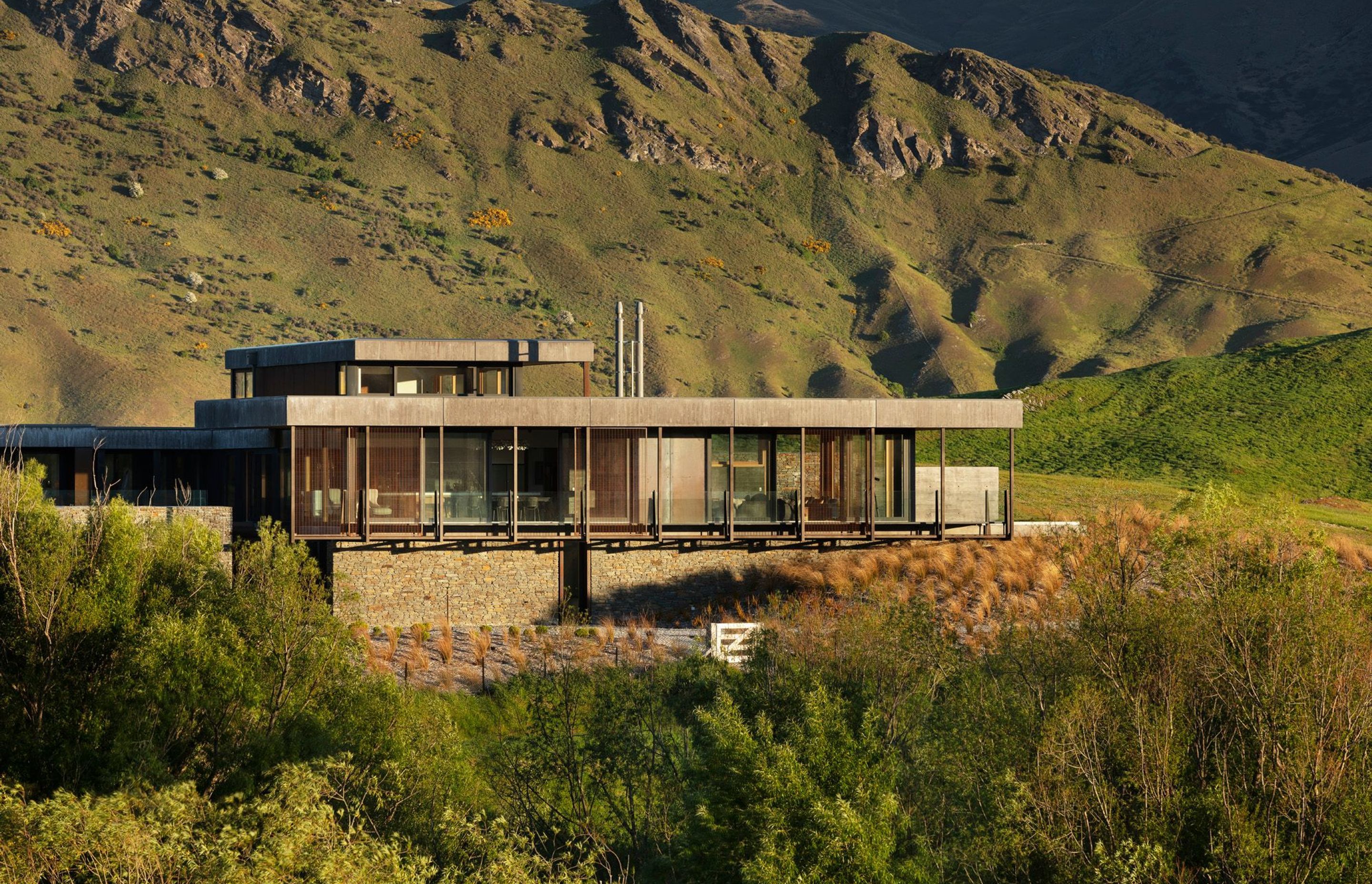 Oliver's Ridge House by Team Green Architects was designed using passive house principles to create a building that’s suited to the climate and minimises energy use, with low-E triple glazing and insulated timber/aluminium joinery. Photograph by Sam Hartn