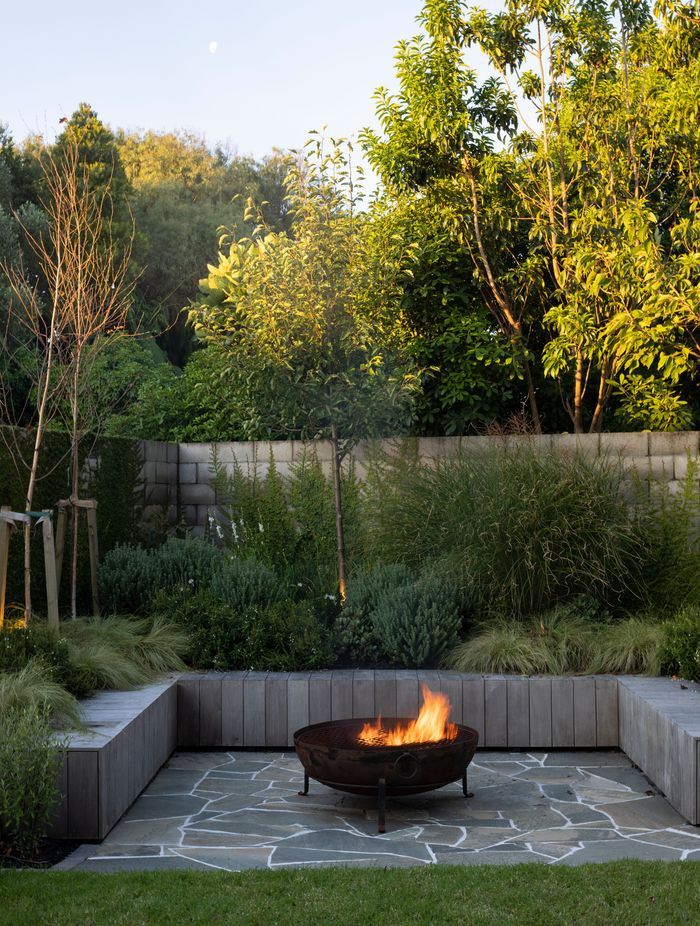 A lusciously overgrown garden welcomes guests