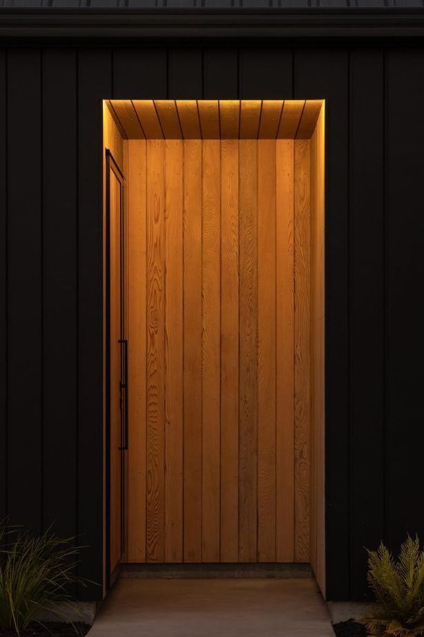 The client requested a lighting design that kept the entryway discreet whilst highlighting the beautiful cedarwood for this Riverhead home.