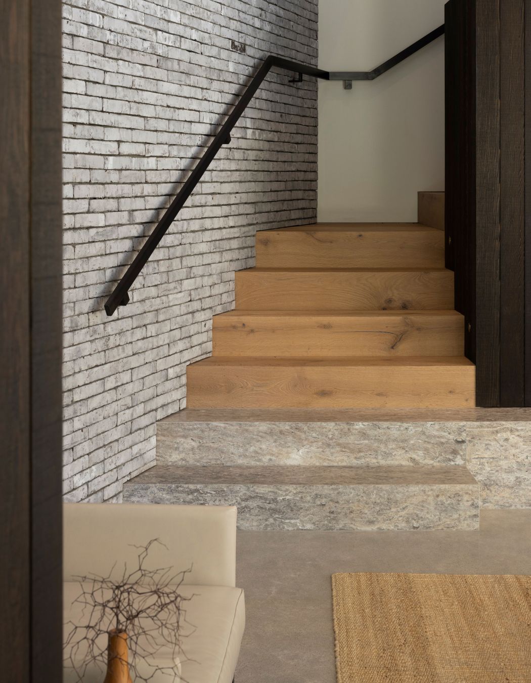 Stellaria bricks meet travertine steps in the lounge