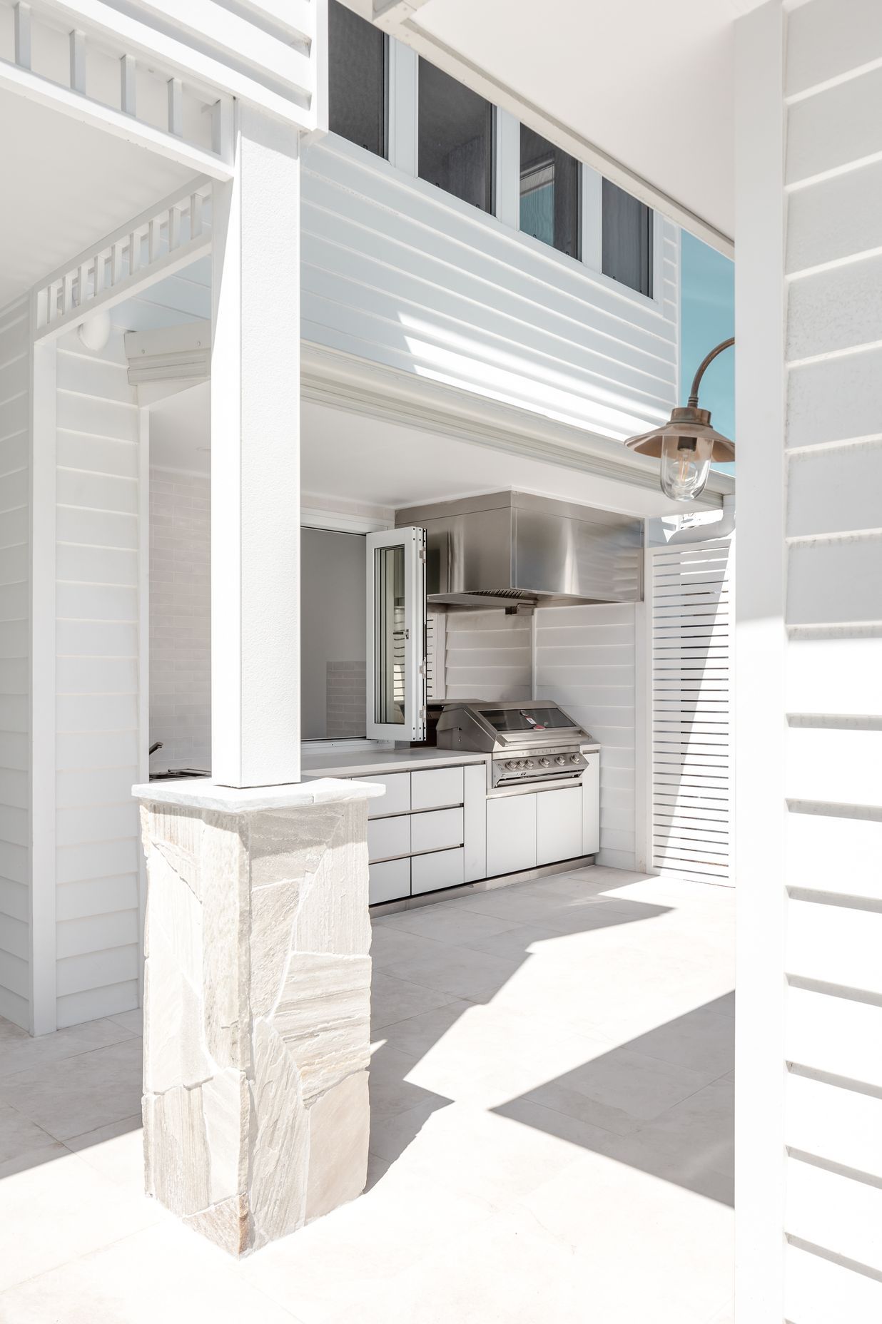 The outdoor kitchen encourages entertaining.
